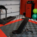Garage gym installed with Ribtrax Pro floor tiles